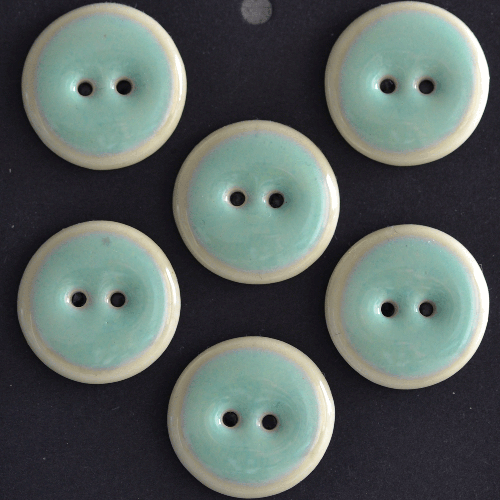 4 pcs. 22-23mm porcelain buttons mint