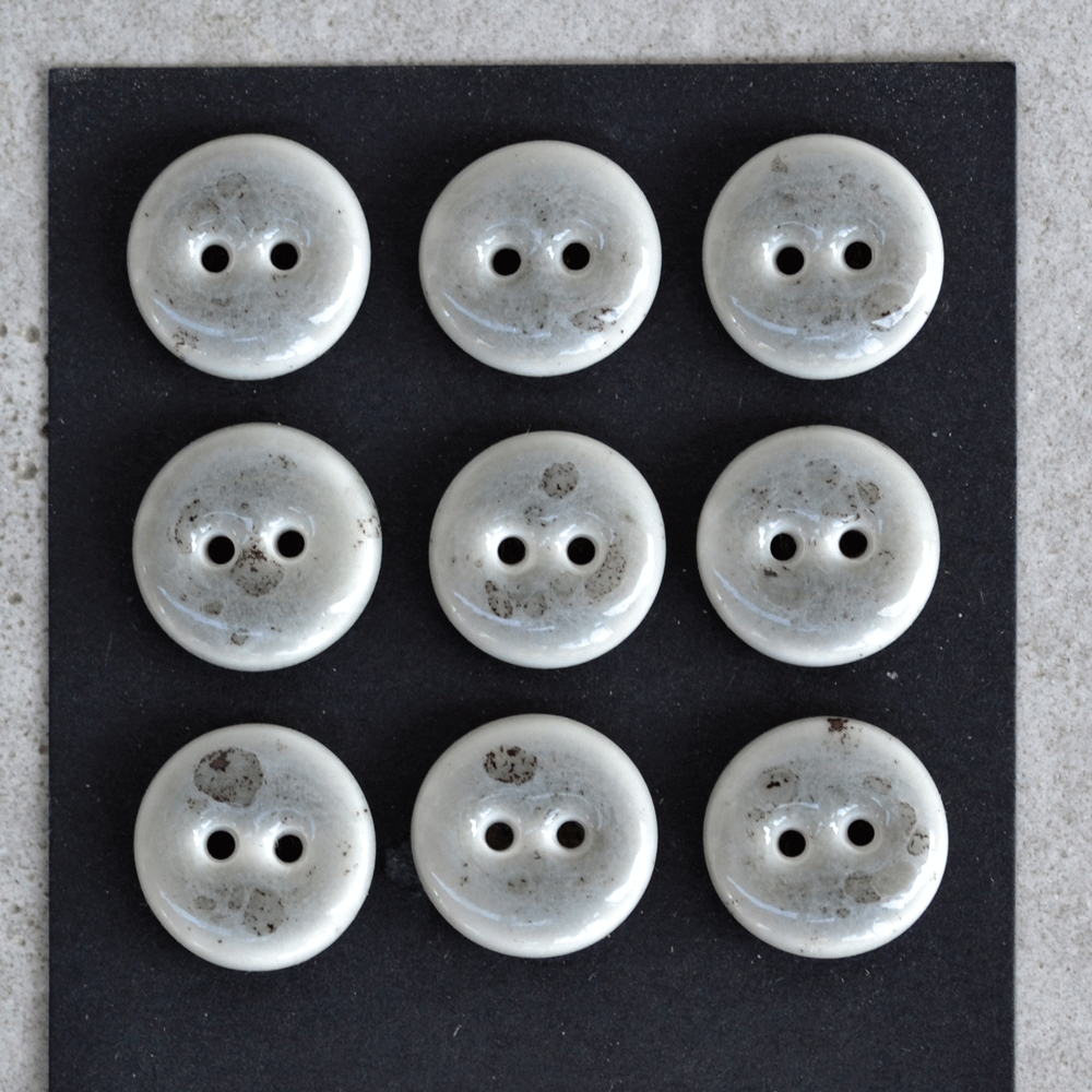 9 pcs. 15-16mm porcelain buttons grey sprinkle