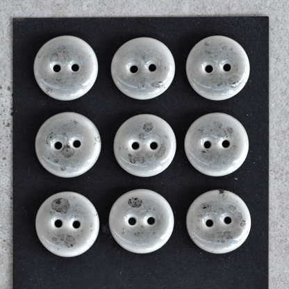 9 pcs. 15-16mm porcelain buttons grey sprinkle