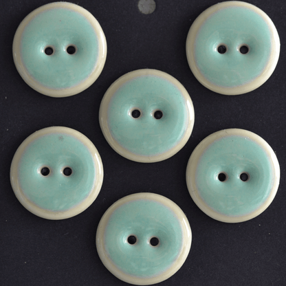 4 pcs. 22-23mm porcelain buttons mint