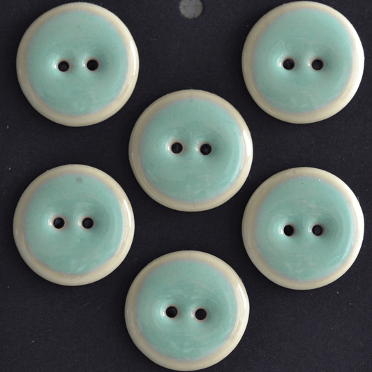 4 pcs. 22-23mm porcelain buttons mint