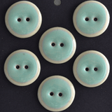 4 pcs. 22-23mm porcelain buttons mint