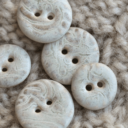 Porcelain buttons marfil