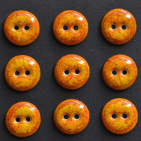 9 pcs. 15-16mm  porcelain buttons glowing orange