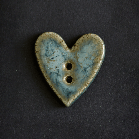 Ceramic button in heart form (alga marina)