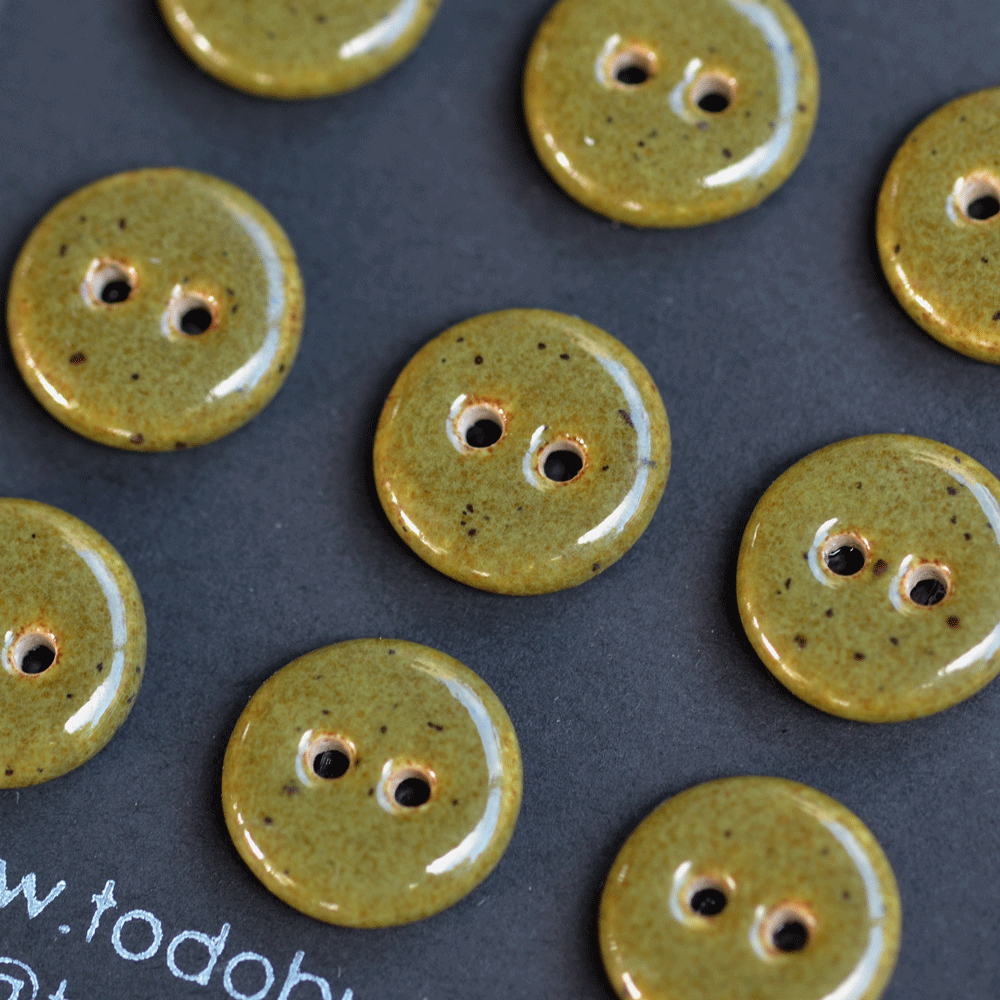 9 pcs. 15-16mm ceramic buttons deep olive speckle