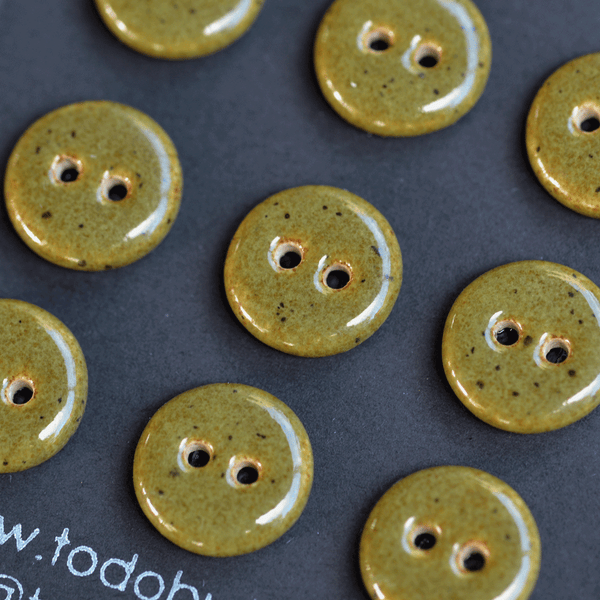 9 pcs. 15-16mm ceramic buttons deep olive speckle