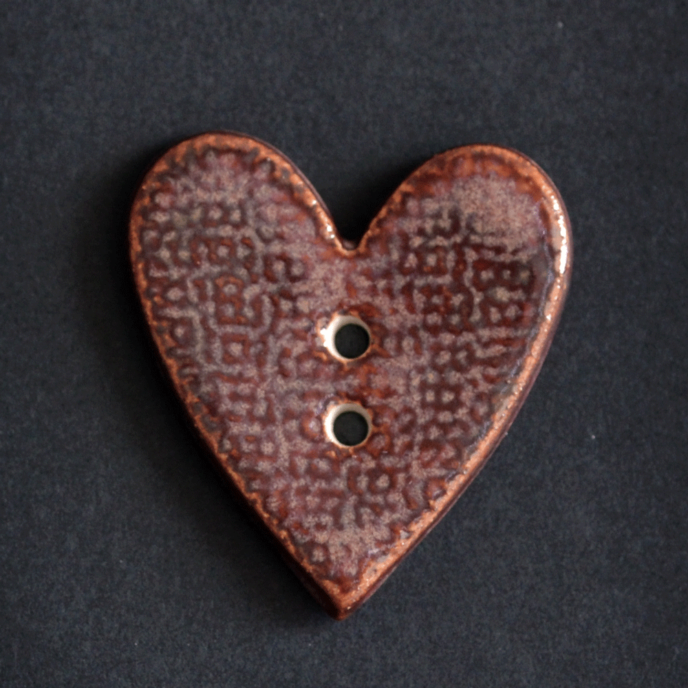 2 pcs. ceramic buttons in heart form