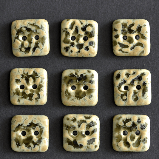 9 pcs. 14x14mm porcelain buttons leo